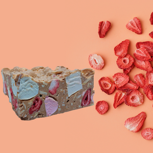 Strawberry and Almond Rocky Road in Caramel chocolate next to Freeze dried strawberries