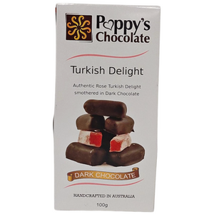 A 100g box of Chocolate Coated Turkish Delight Dark Chocolate by Poppy's Chocolate is ideal for gifting, featuring rose-flavored Turkish delight wrapped in luxurious dark chocolate. The packaging, primarily white with sophisticated brown and red accents, is handcrafted in Australia.